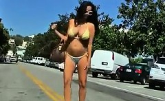 Busty Babe Walking Around Outside In A Bikini